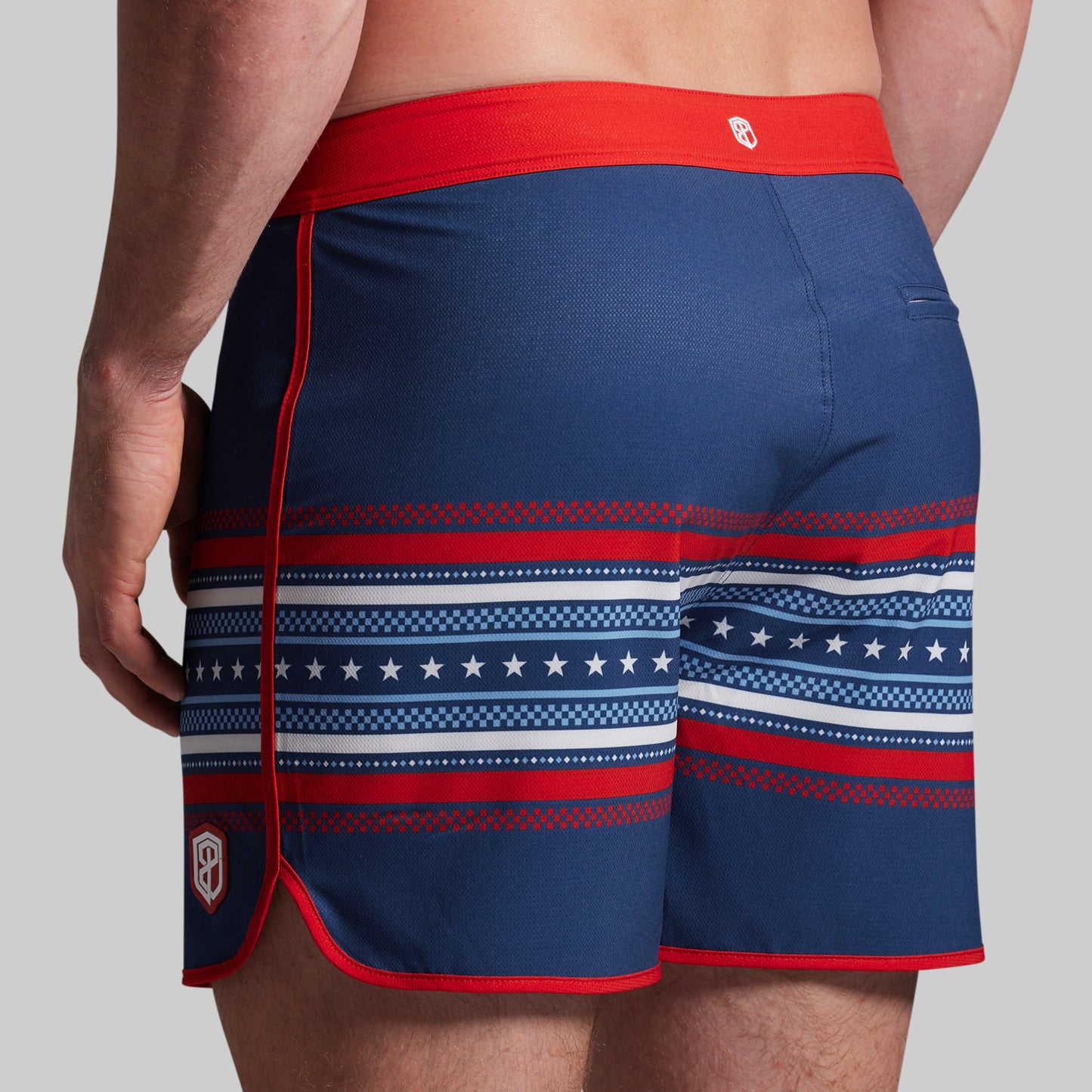 Blue shorts with American flag pattern.