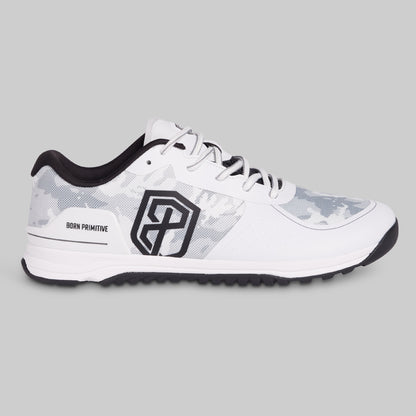 White athletic shoe with black accents on a gray background