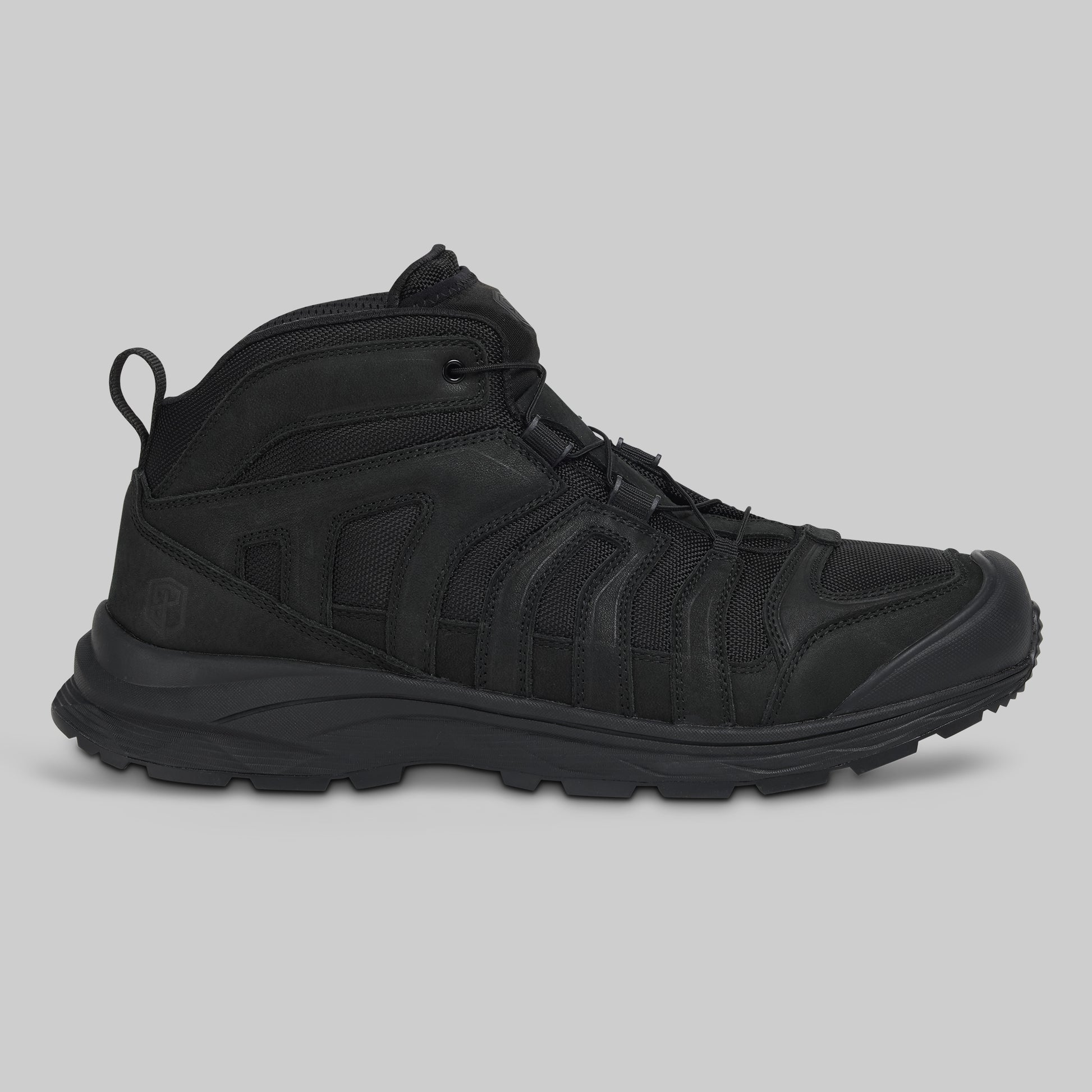 Black boot on a gray background