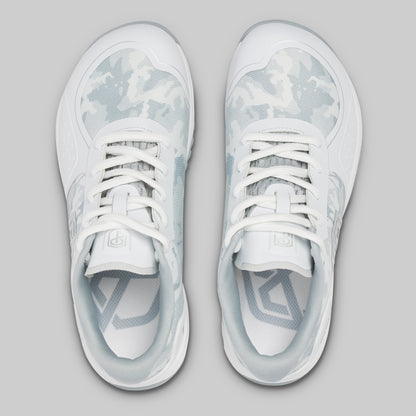 White sneakers with gray accents on a light gray background