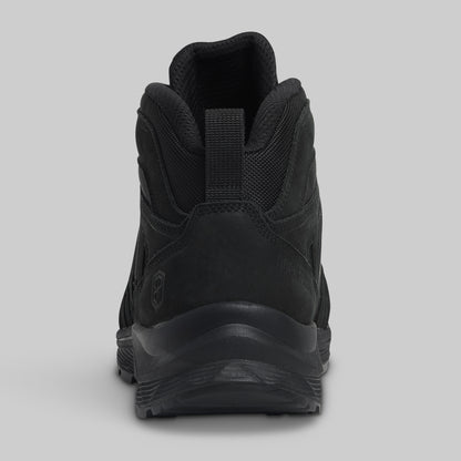 Black boot on a gray background
