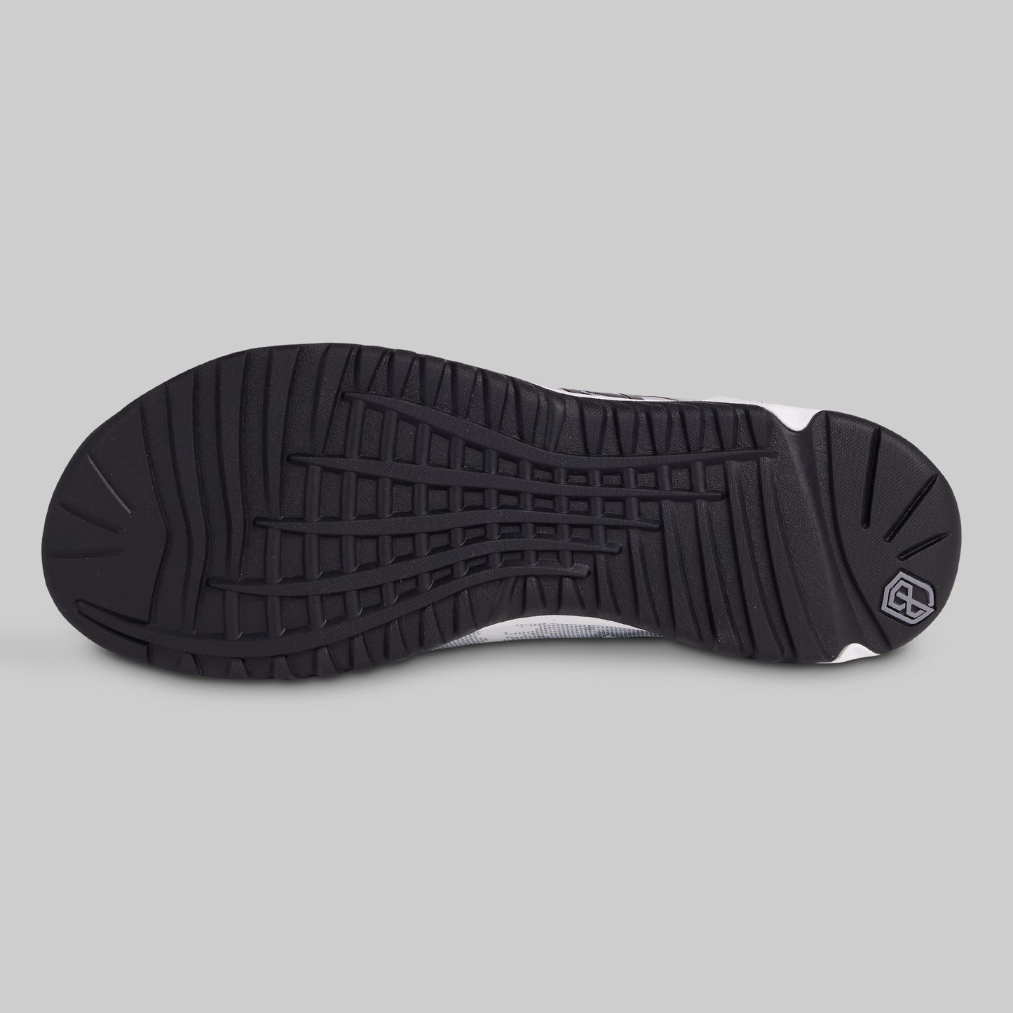 Black sole of a sneaker on a gray background