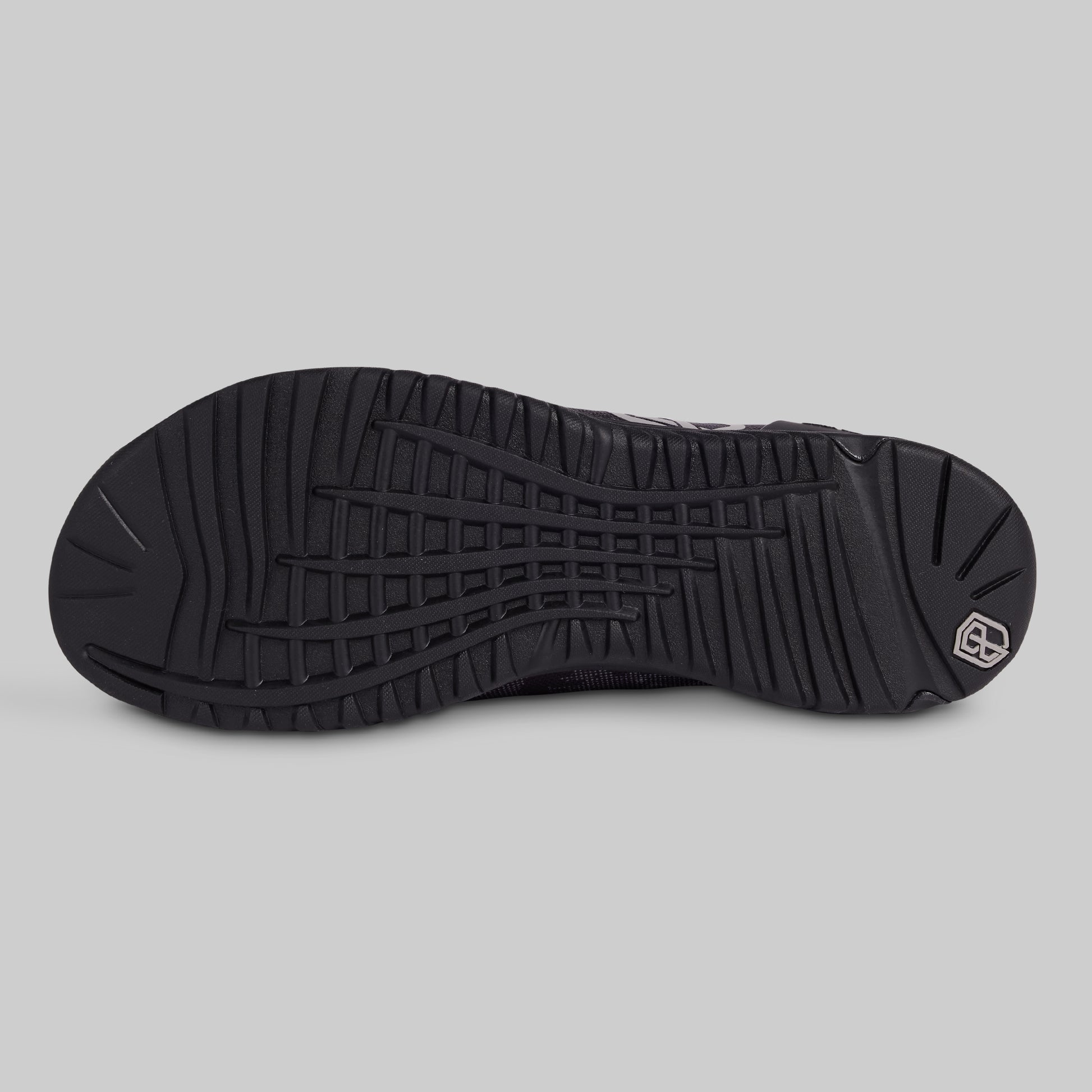 Black shoe sole on a gray background