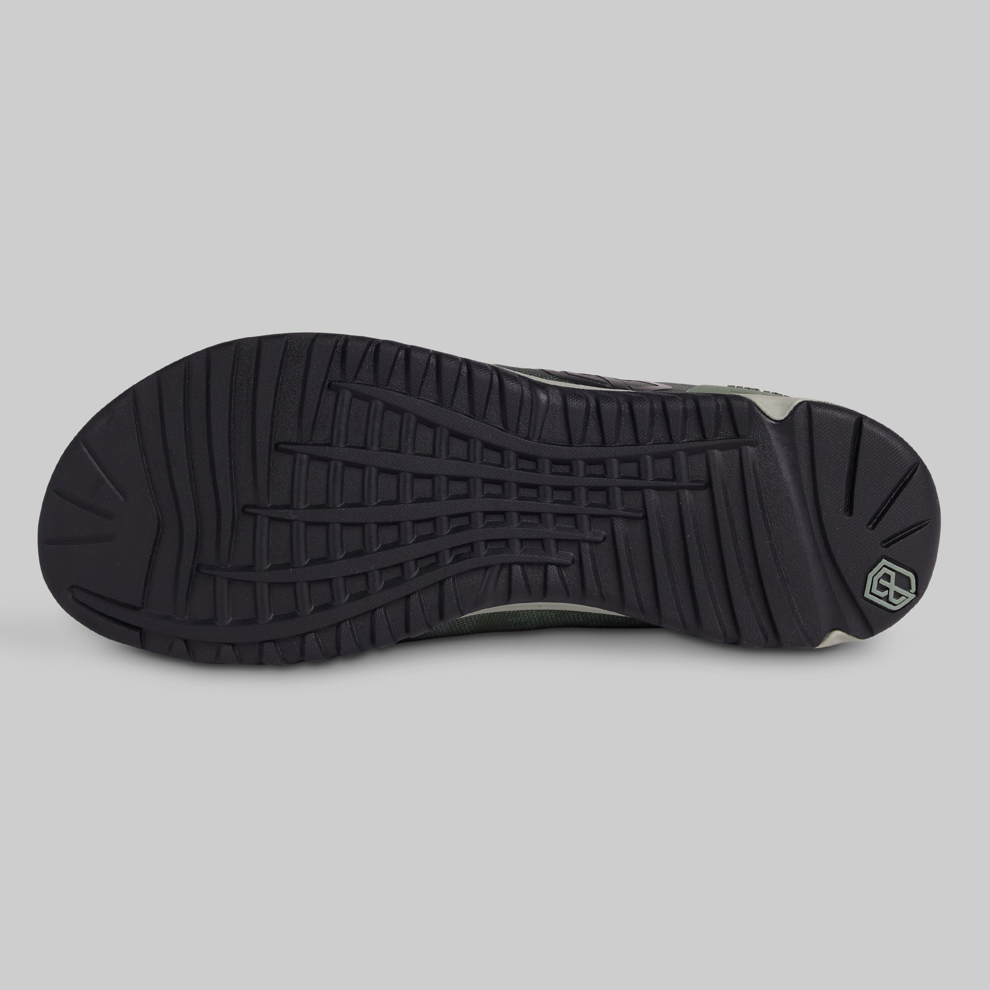 Black sole of a shoe on a gray background