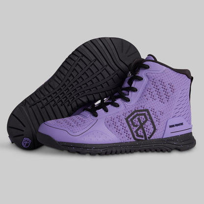 Purple high-top sneakers with black soles on a gray background