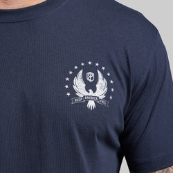 Navy blue t-shirt with white graphic design on a gray background