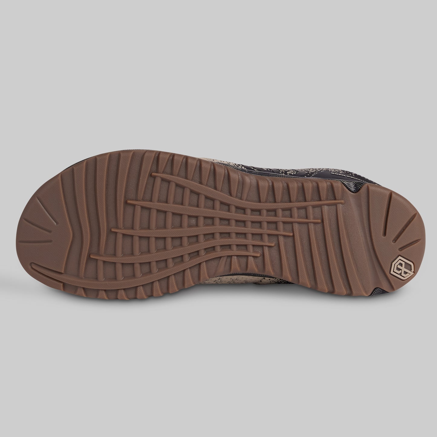 Brown shoe sole on a gray background