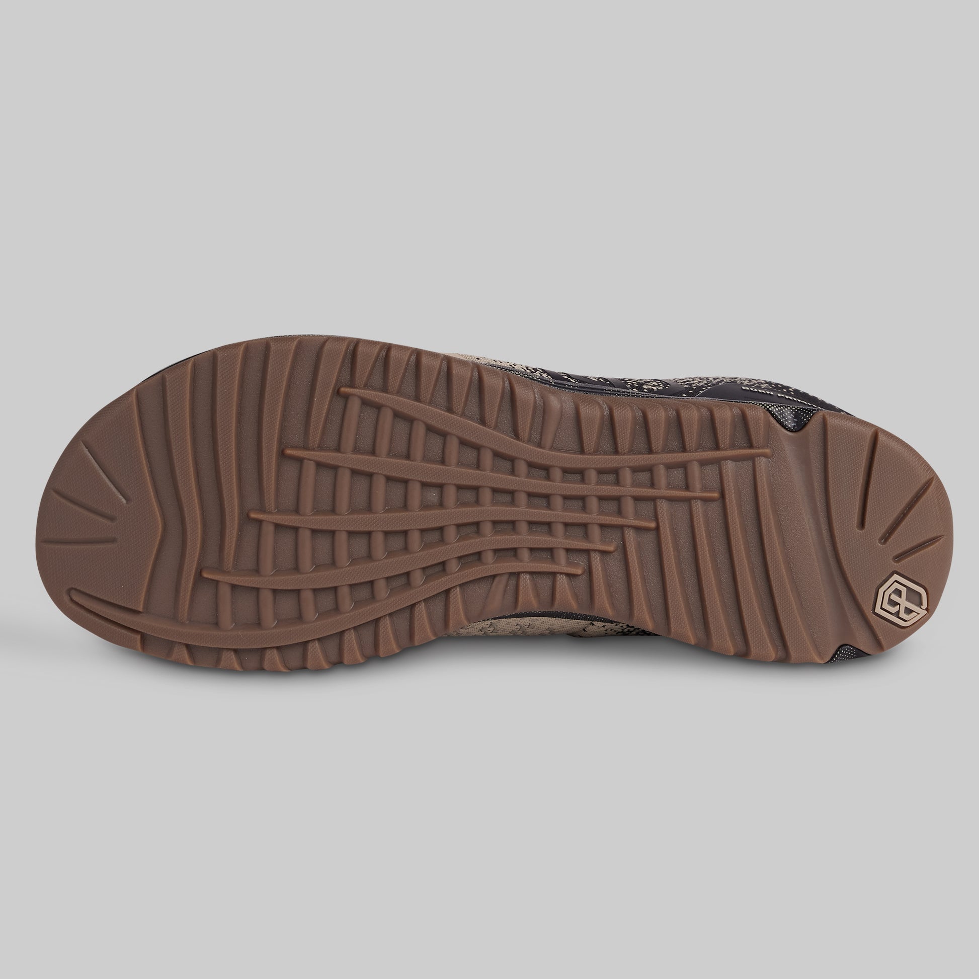 Brown shoe sole on a gray background