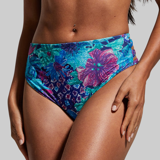 A high-rise bikini bottom with a multicolor floral pattern and cheeky coverage.