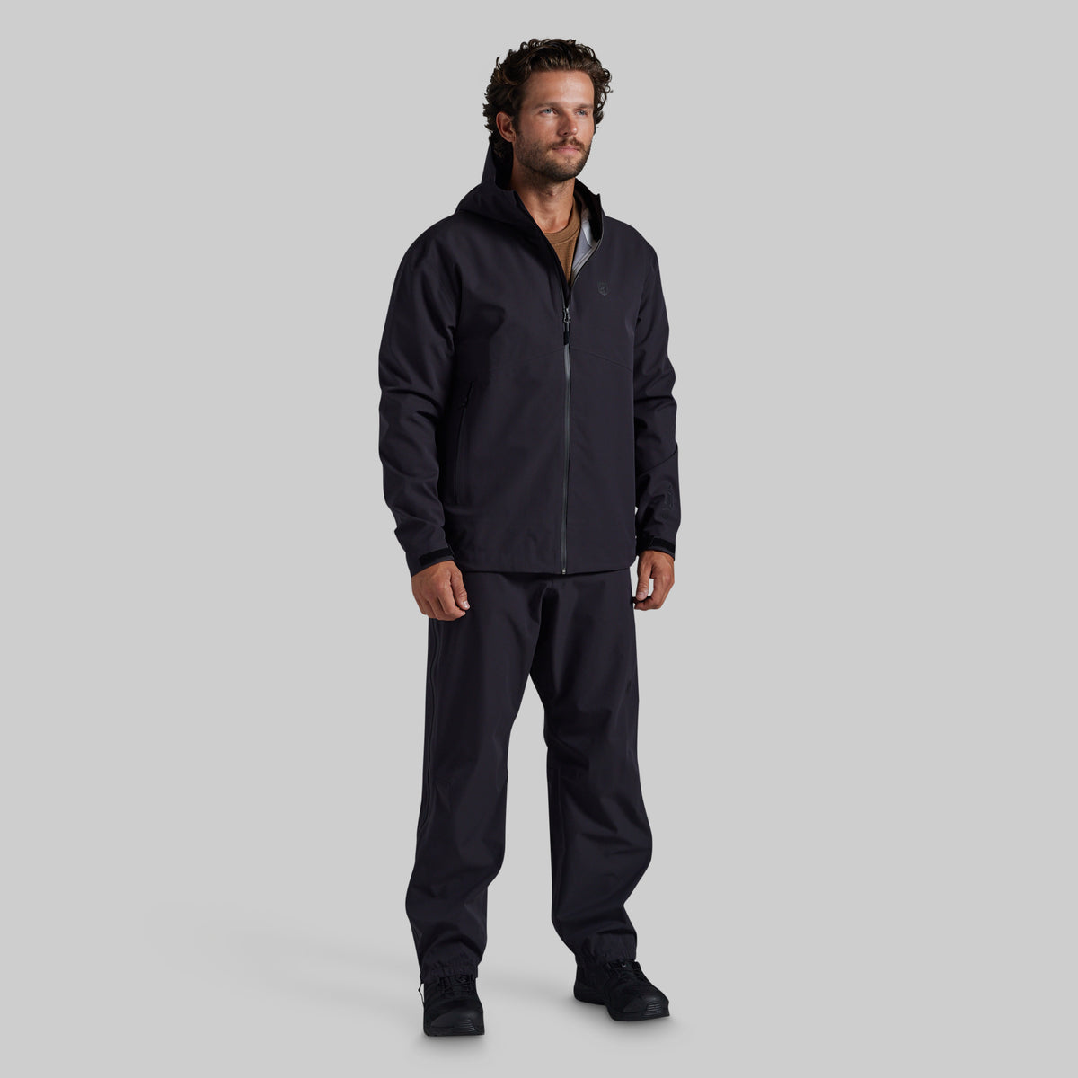 Full front view of black Mission FLEX Rain Pant 2.0 with matching rain jacket