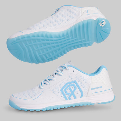 White athletic shoes with blue soles on a gray background