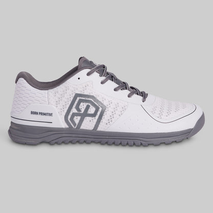 White and gray athletic shoe on a light gray background