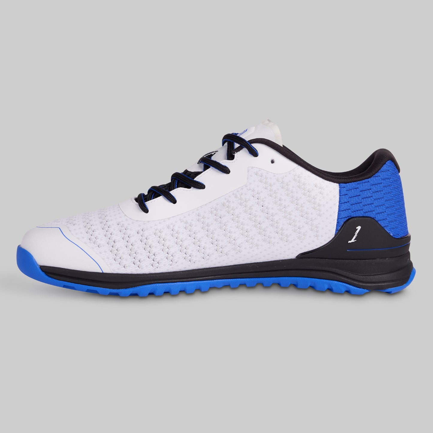 White and blue athletic shoe on a gray background