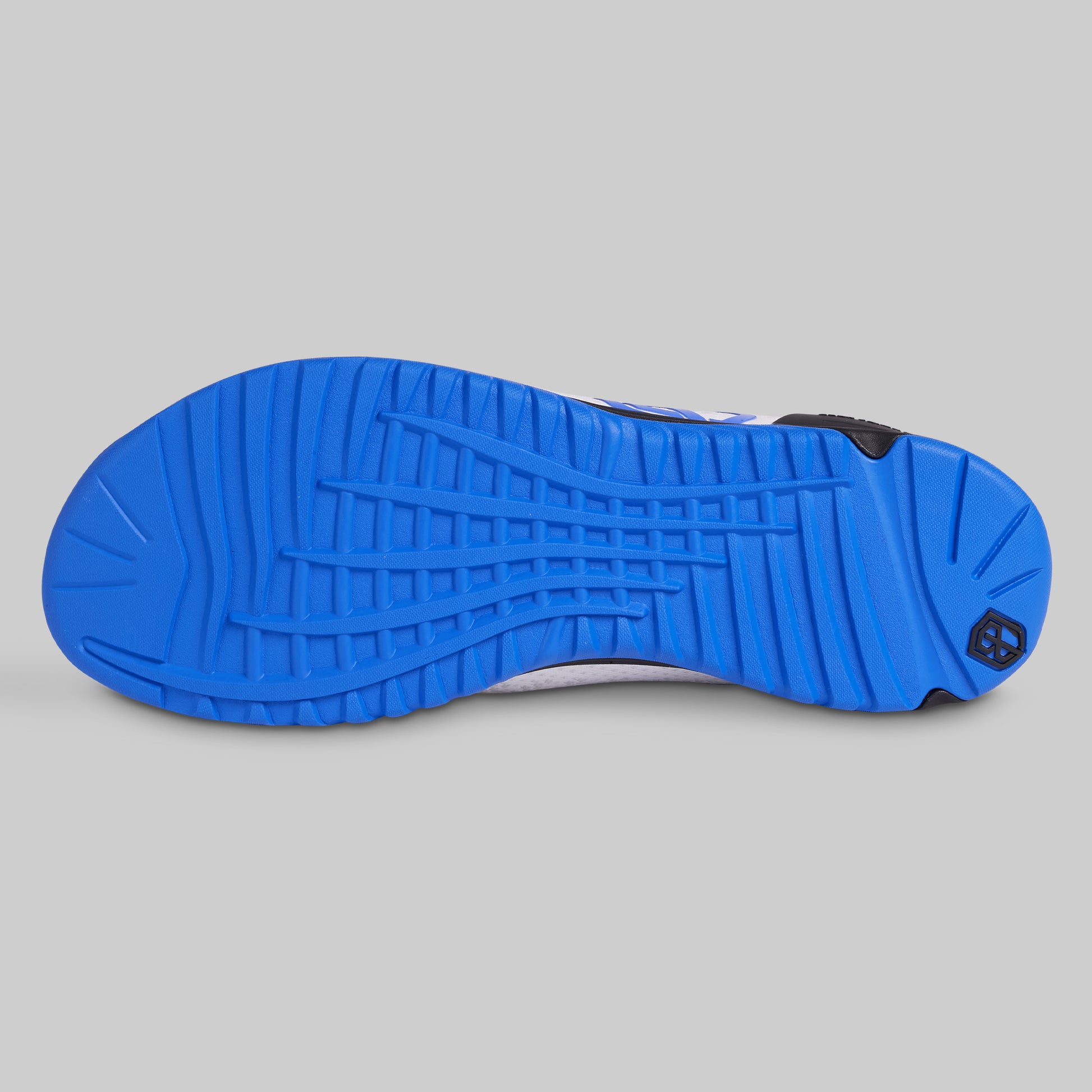 Blue sole of a shoe on a gray background