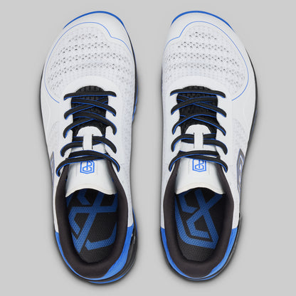 White athletic shoes with blue accents on a gray background