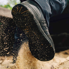 Defender 1 duty boot black being worn while running in sand 
