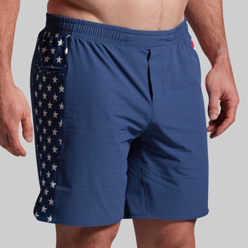 Blue shorts with American flag pattern on a gray background