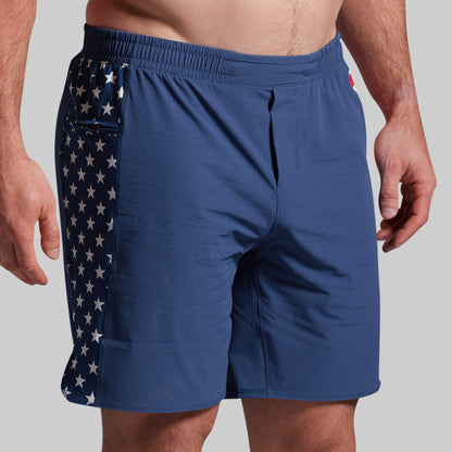 Blue shorts with American flag pattern on a gray background