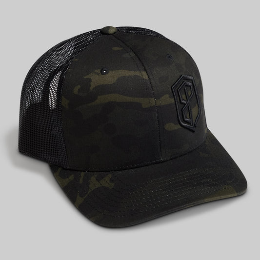Camouflage trucker hat with a logo on a gray background