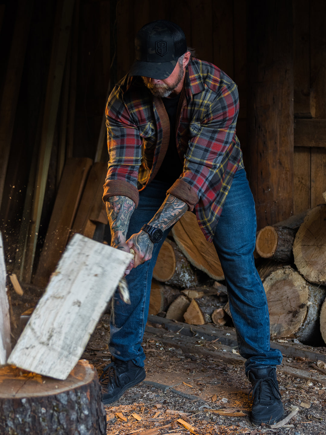 Black Urban Recon 1 shoe splitting firewood 