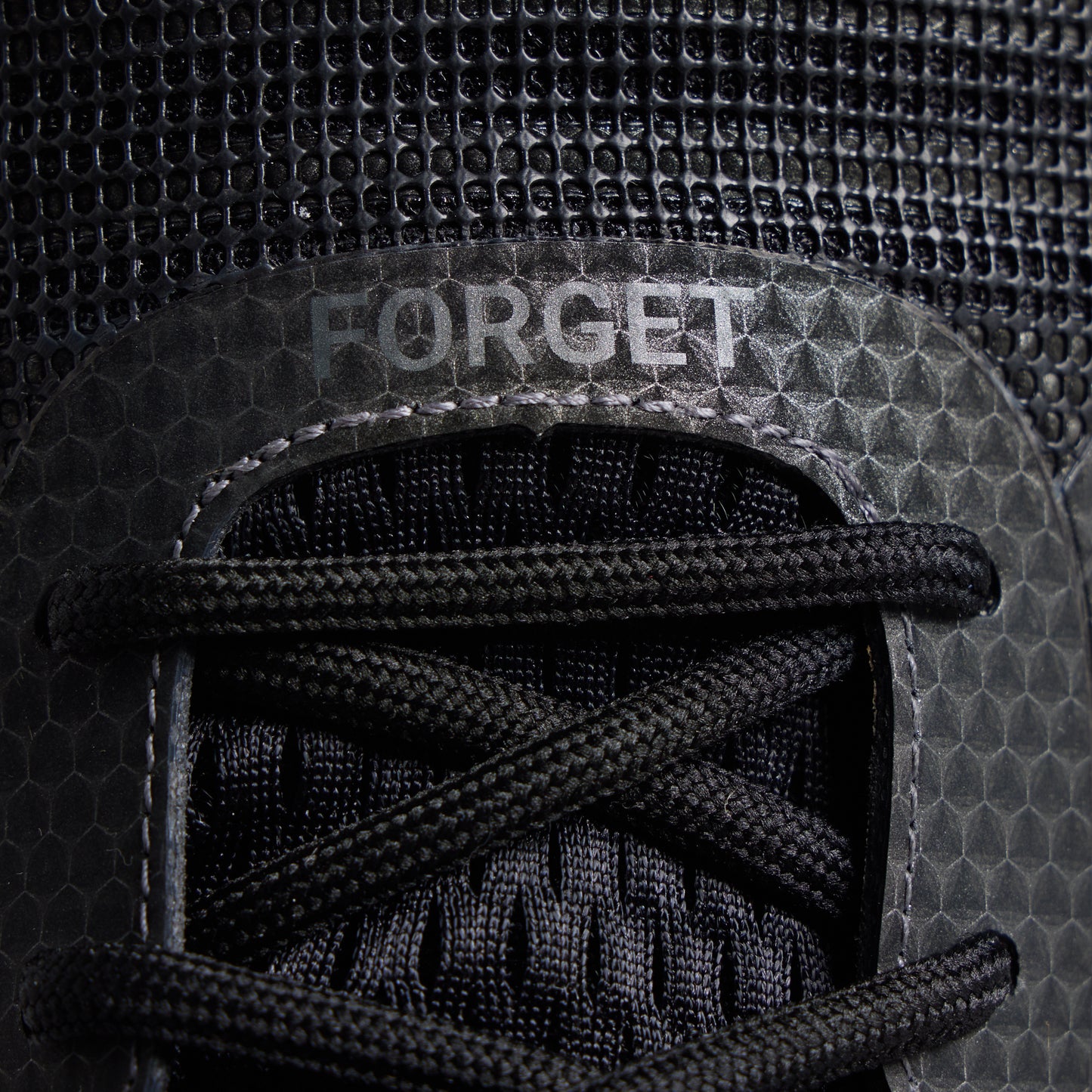 Men's 9/11 Savage 1 training shoe close-up with FORGET top-panel detail
