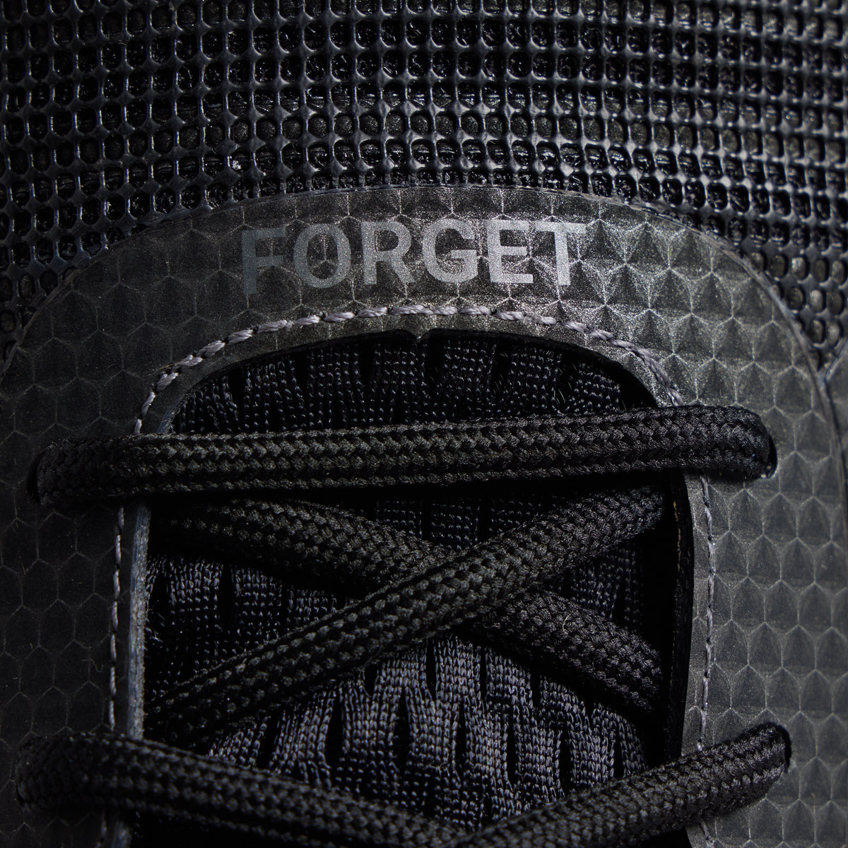 Women's 9/11 Savage 1 training shoe close-up with FORGET top-panel detail