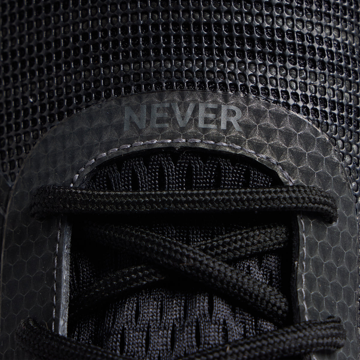 Men's 9/11 Savage 1 training shoe close-up with NEVER hook-and-loop strap detail