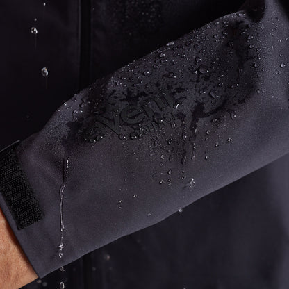 Water beading on the sleeve of the black Mission FLEX Rain Jacket 2.0
