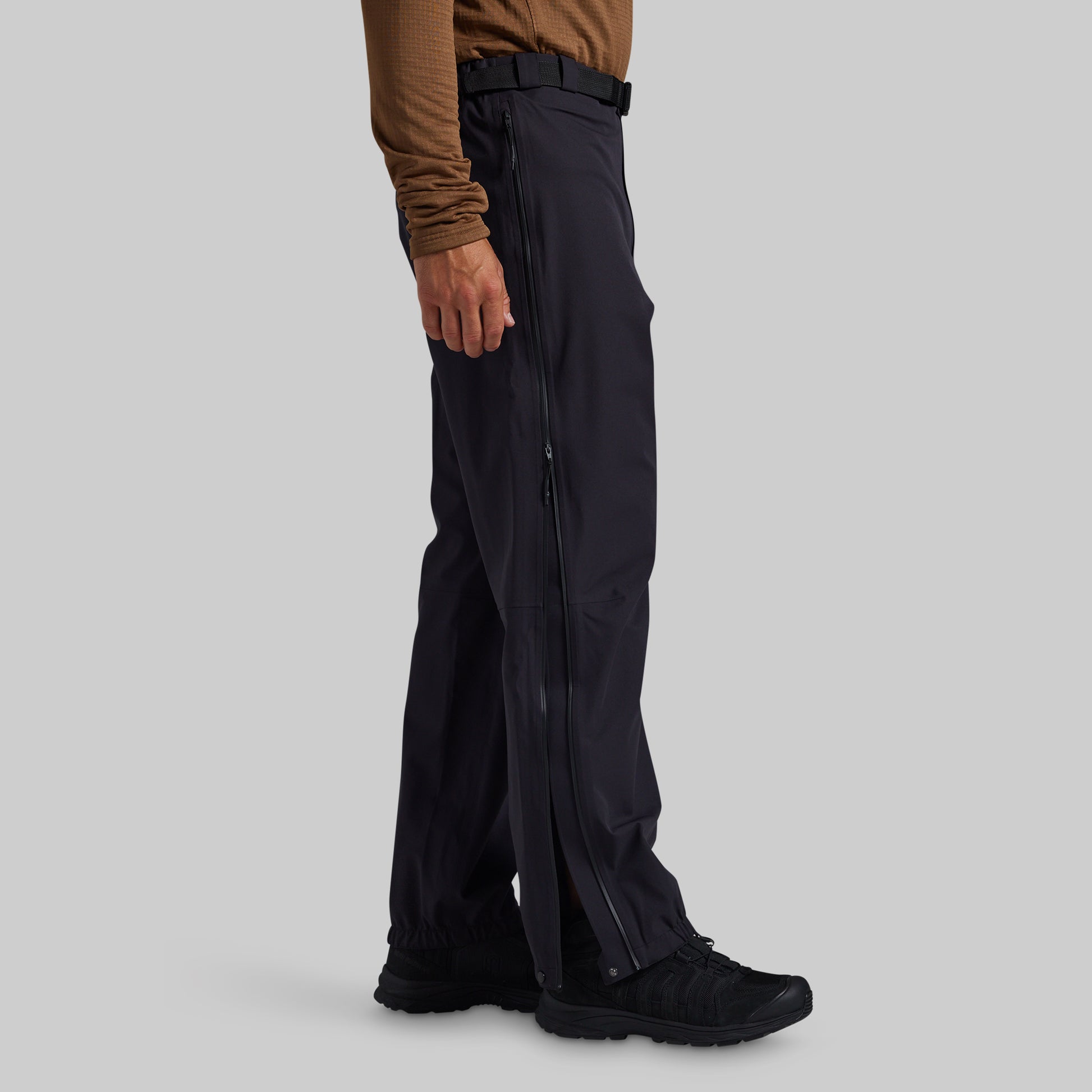 Side view of black Mission FLEX Rain Pant 2.0 with full-length zipper