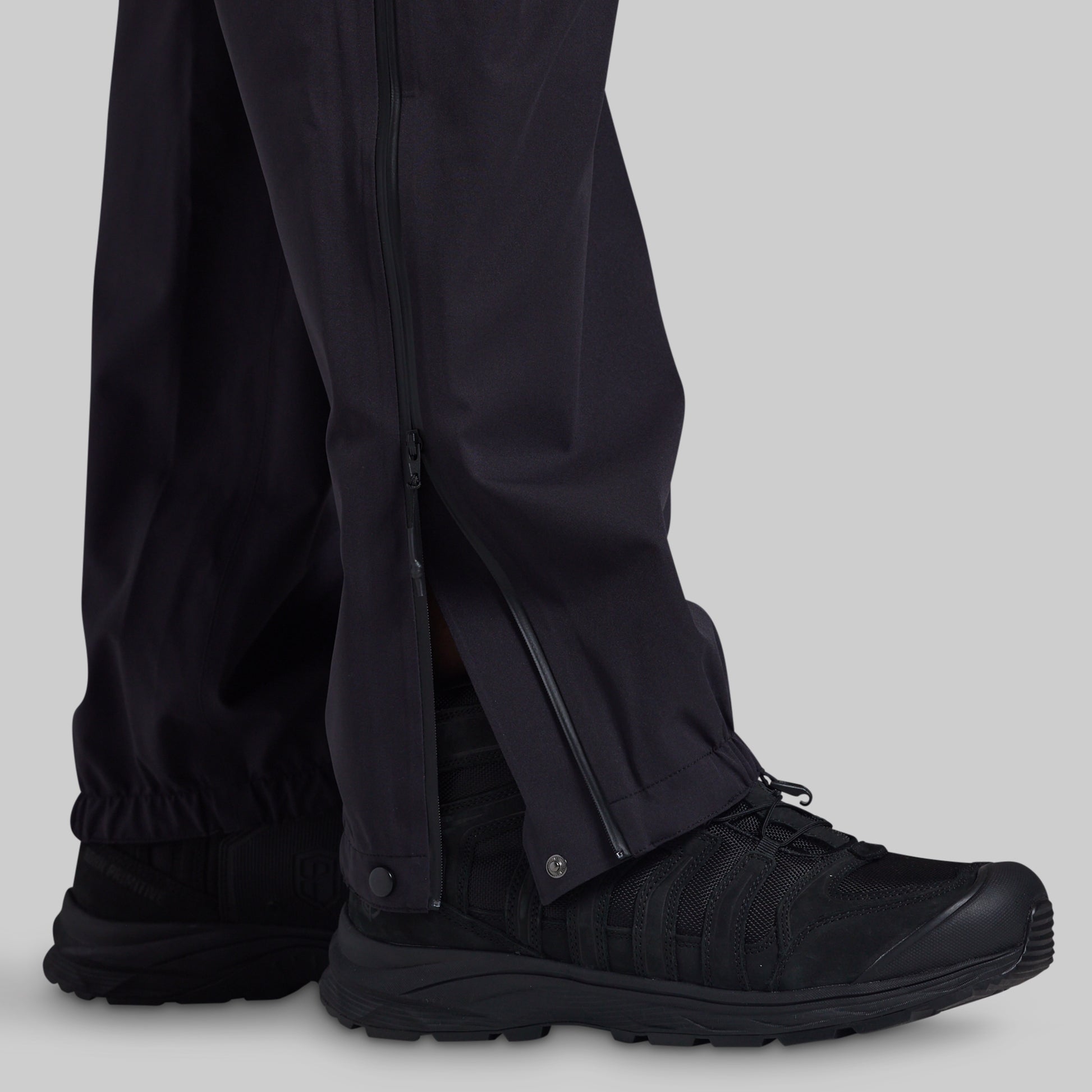 Side zipper and snap cuff on black Mission FLEX Rain Pant 2.0