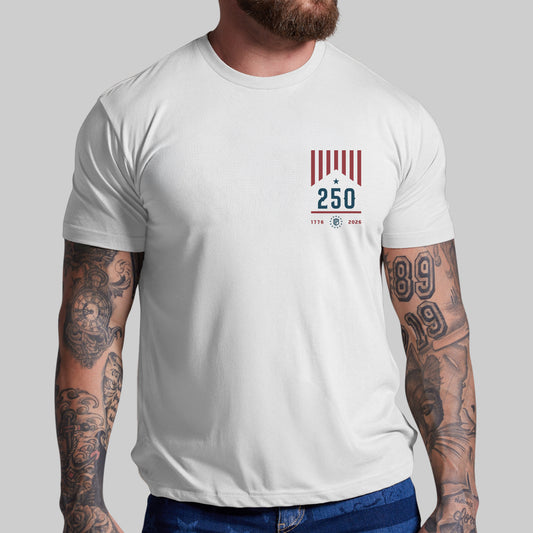 Man wearing a white t-shirt with a graphic design on a plain background