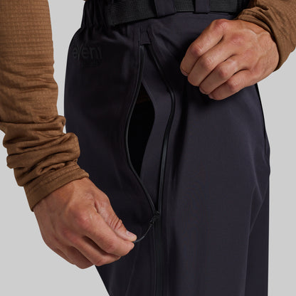 Pass-through pocket access on black Mission FLEX Rain Pant 2.0