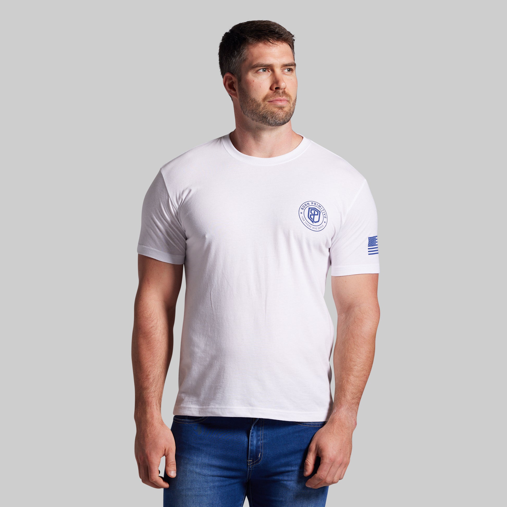 Man wearing a white t-shirt with a logo on a gray background