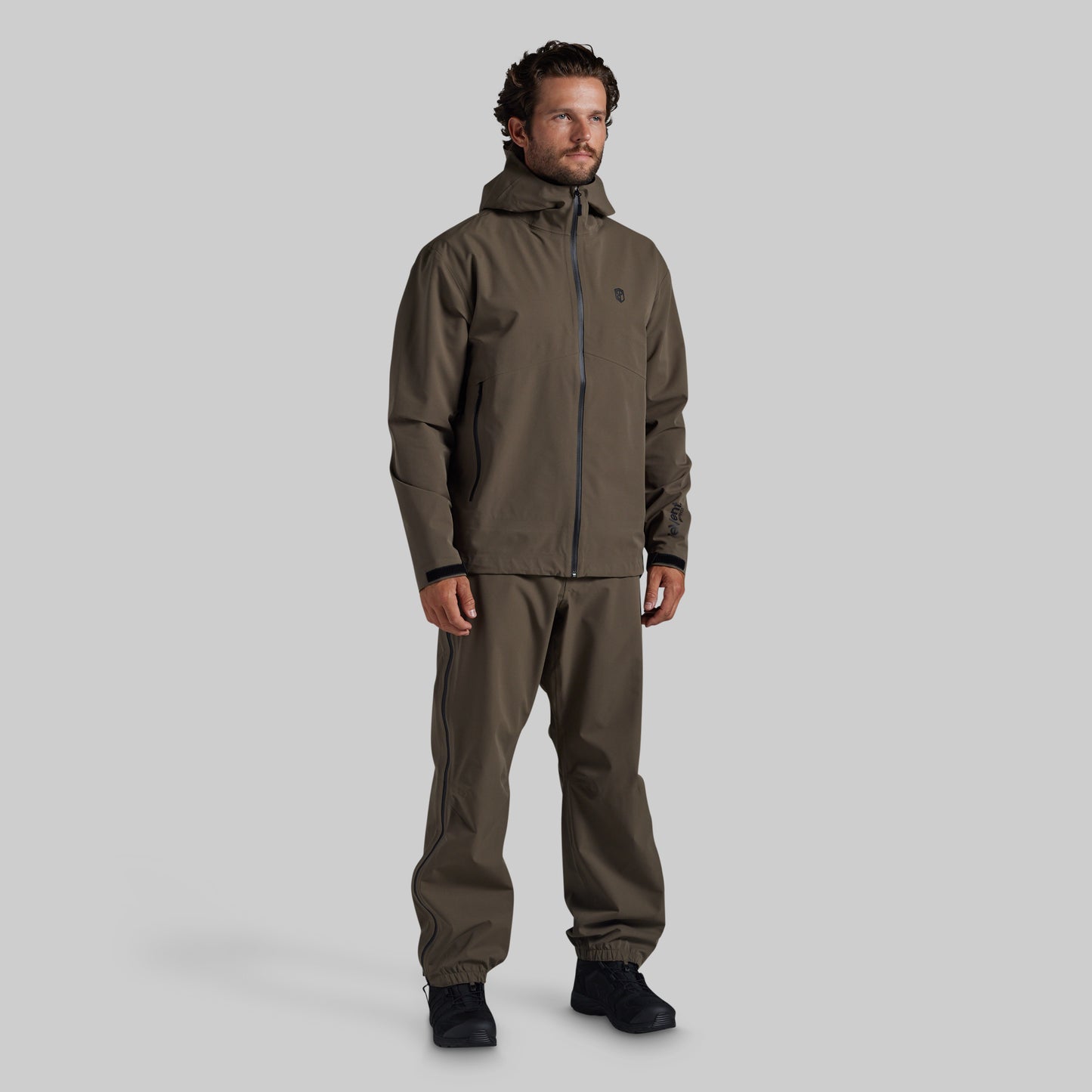 Full front view of Ranger Green Mission FLEX Rain Pant 2.0 with matching rain jacket