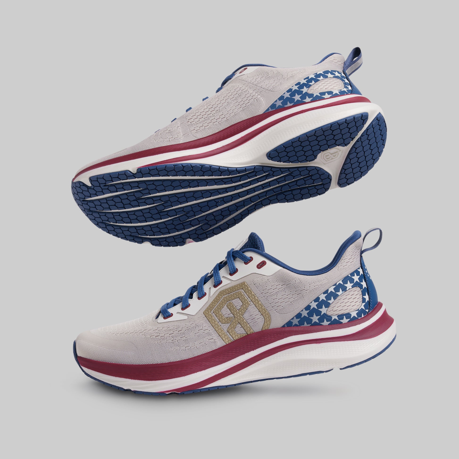 Pair of running shoes with American flag design on a gray background