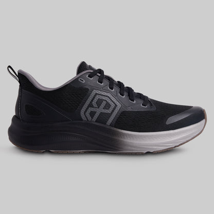 Black running shoe with a visible brand logo on a gray background