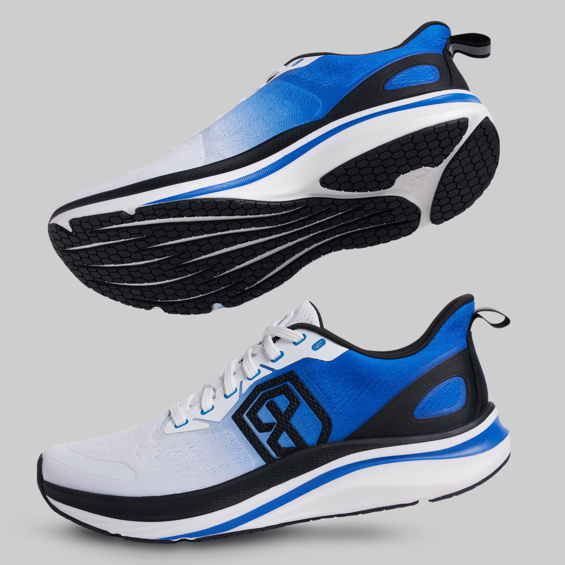 Blue and black athletic shoes on a gray background