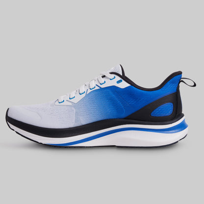 Blue and black athletic shoe on a gray background