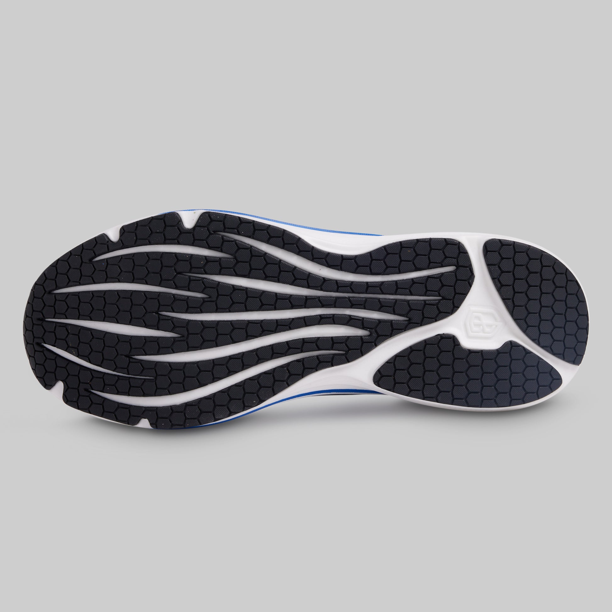 Sole of a running shoe with a brand logo on a gray background
