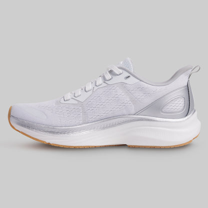 White running shoe on a gray background