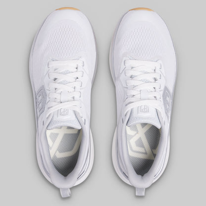 White athletic shoes on a gray background