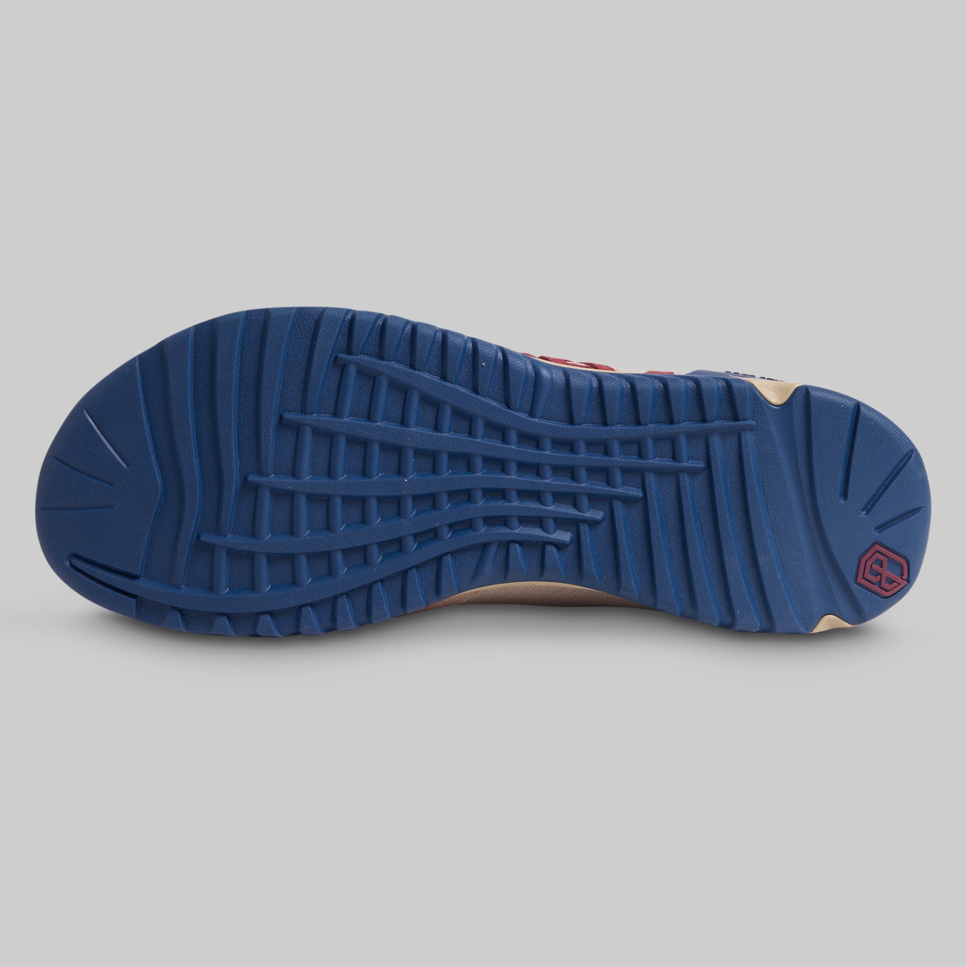 Blue sole of a shoe on a gray background