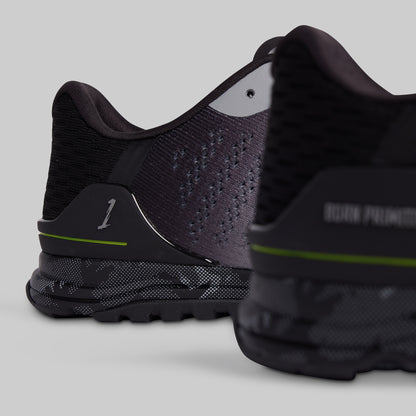 Black athletic shoes with brand name on a light gray background