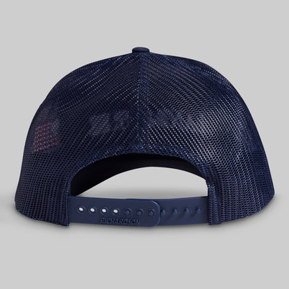 Navy blue mesh cap on a gray background