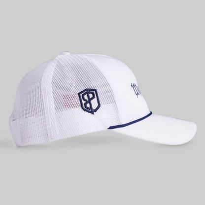 White mesh cap with navy logo on a gray background